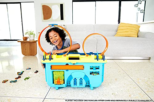 Hot Wheels Caja de pistas con lanzador Set de juego para construir pistas de juguete, con 30 piezas, incluye 1 vehículo die-cast (Mattel GVG11)