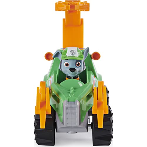 PAW Patrol Dino Rescue Rocky's Deluxe Rev Up Vehículo con figura de dinosaurio misterioso