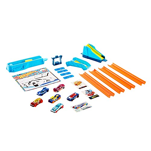 Hot Wheels Pack celebración 6 vehículos sorpresa con pistas de coches de juguete y set para pintar con pegatinas (Mattel GWN96)