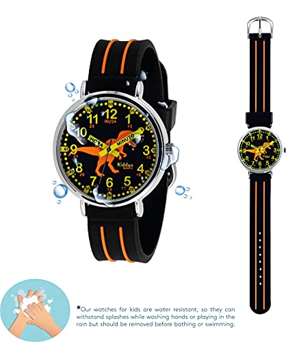 KIDDUS Reloj Educativo para niño, Chica, Chico. De Pulsera, analógico. Time Teacher fácil de Leer para Aprender la Hora. Ejercicios incluídos. Dinosaurio. Negro y Naranja. Manillas escritas
