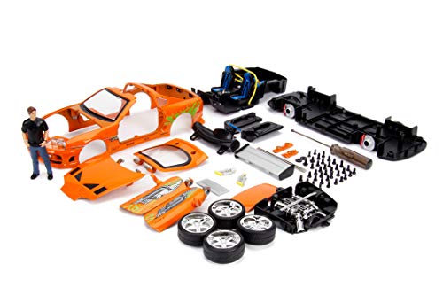 Jada Toys Fast & Furious Brian's 1995 Toyota Supra Build+Collection - Maqueta de Coche Tuning, Escala 1:24, Incluye Figura Brian O'Conner, Color Naranja